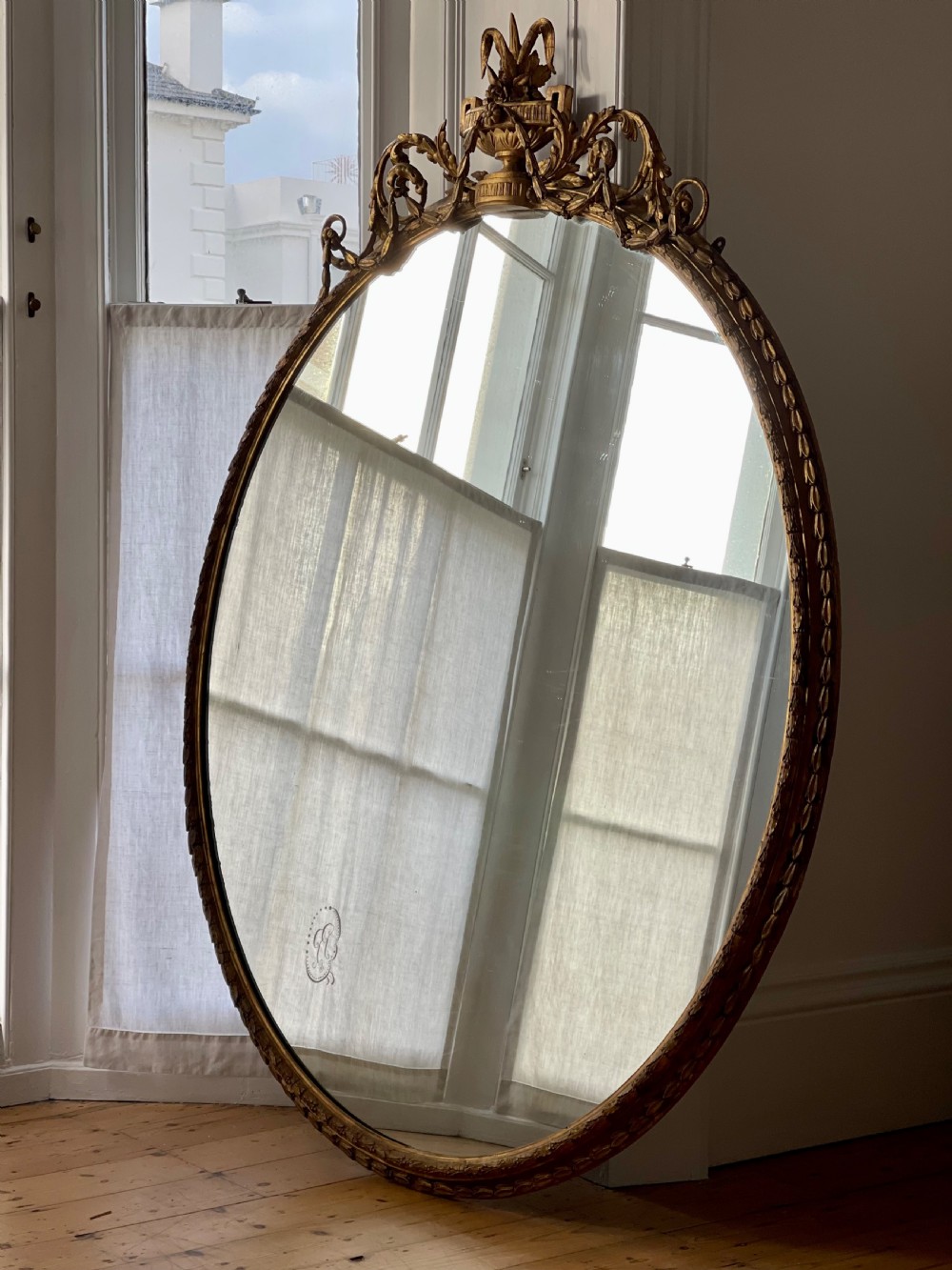 Large antique English  gilt oval mirror  View II