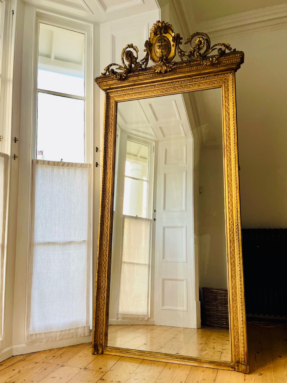 Large antique French gilt leaner mirror 