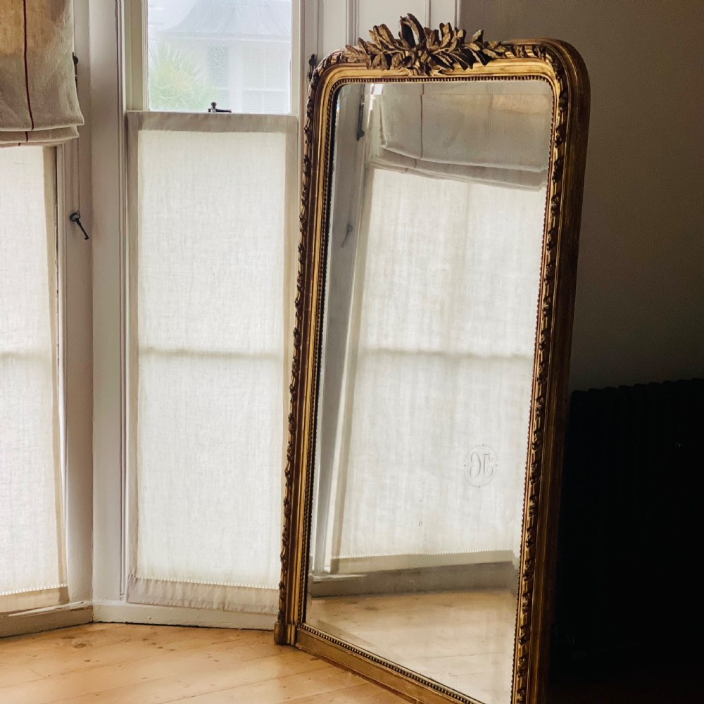 Large antique French gilt leaner mirror - bevelled mercury glass View XV