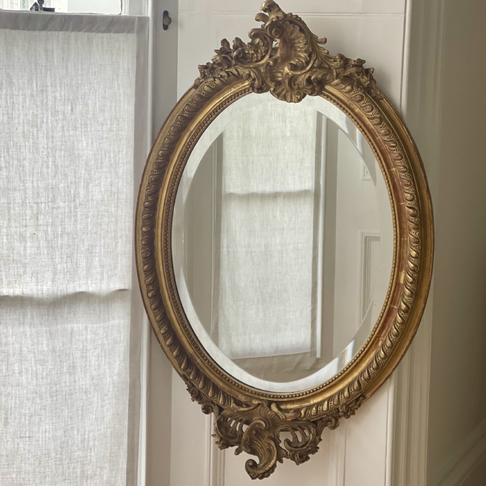 Antique French gilt oval mirror