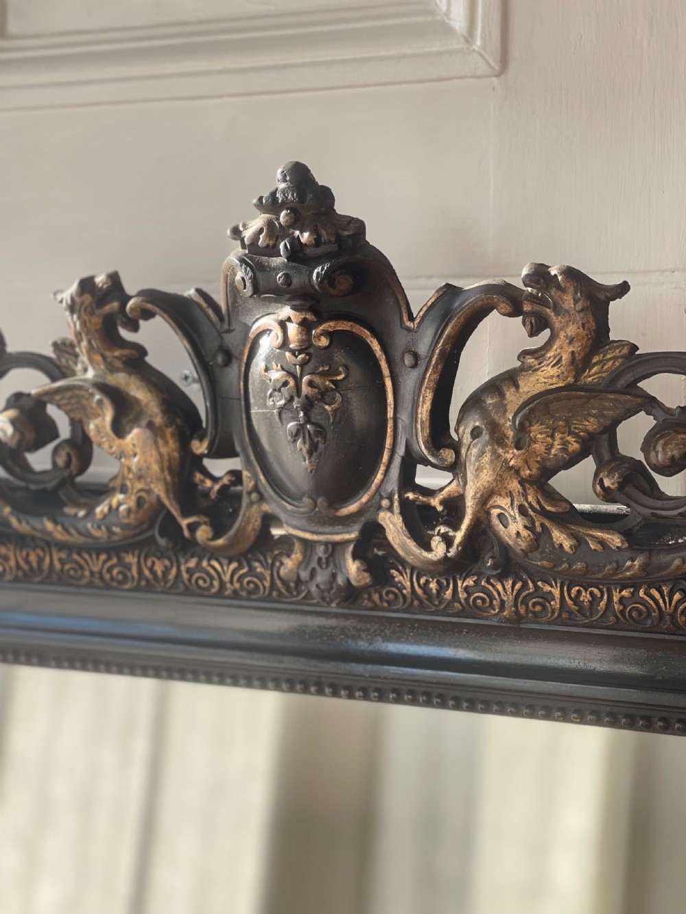 Large antique French and gilt ebonised mirror  View V