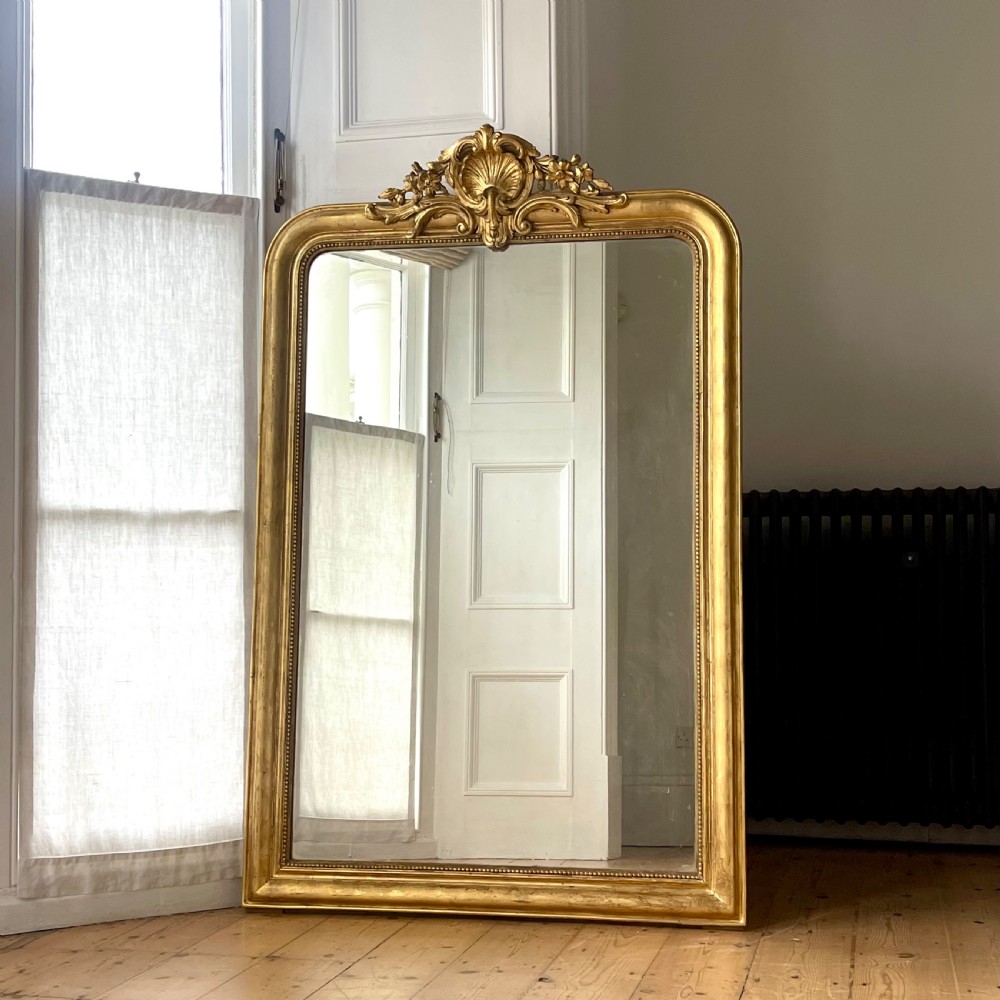 Antique French gilt crested mirror
