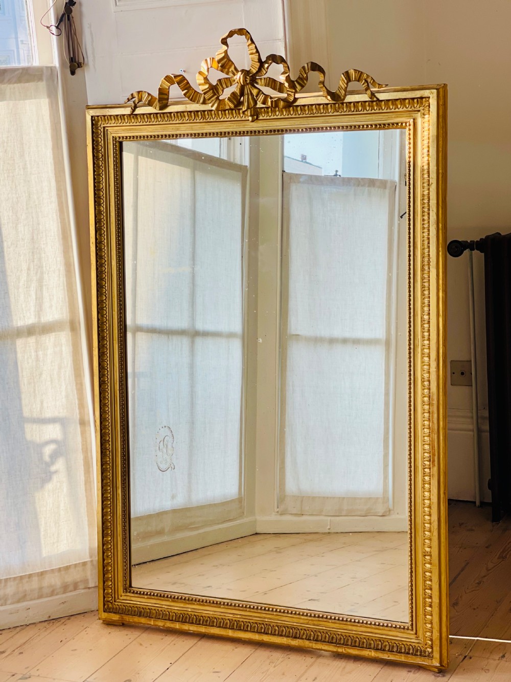 Antique French gilt Louis XVI ribbon mirror