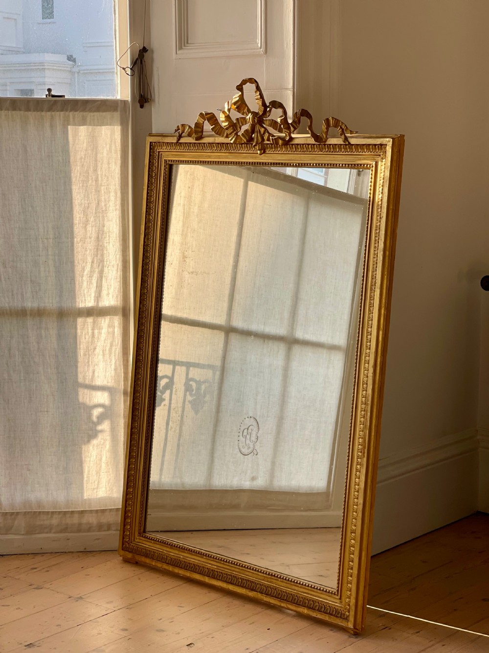 Antique French gilt Louis XVI ribbon mirror View VII