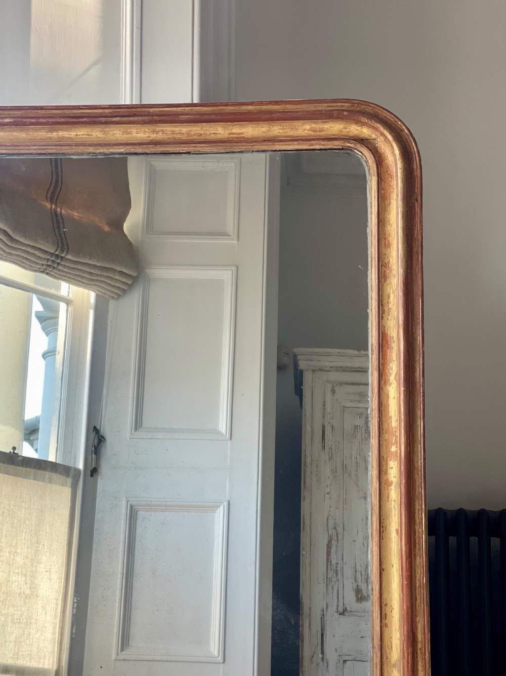Large antique French worn gilt mirror View III