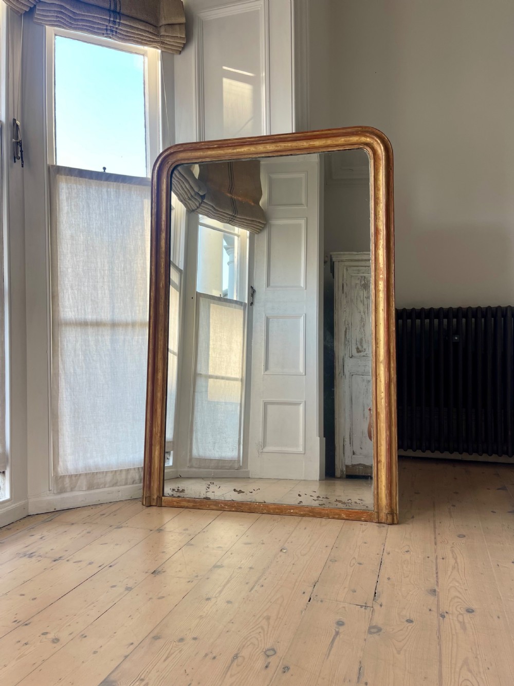 Large antique French worn gilt mirror View V
