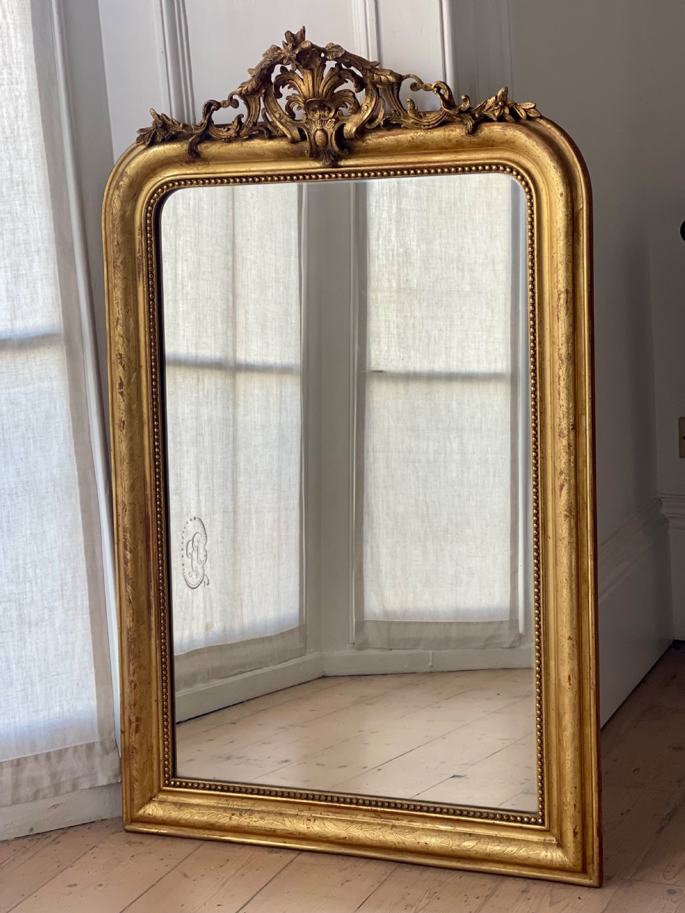 Antique French gilt Louis Philippe mirror with crest