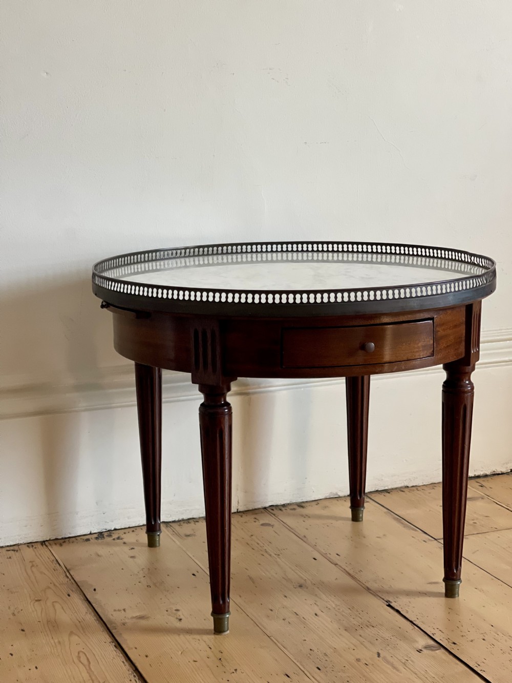 Antique French round coffee table with marble top