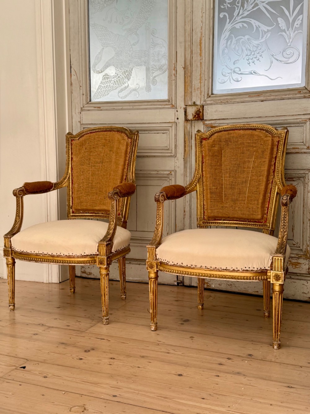 Pair of antique French giltwood armchairs View II