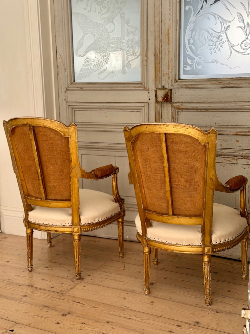 Pair of antique French giltwood armchairs View X