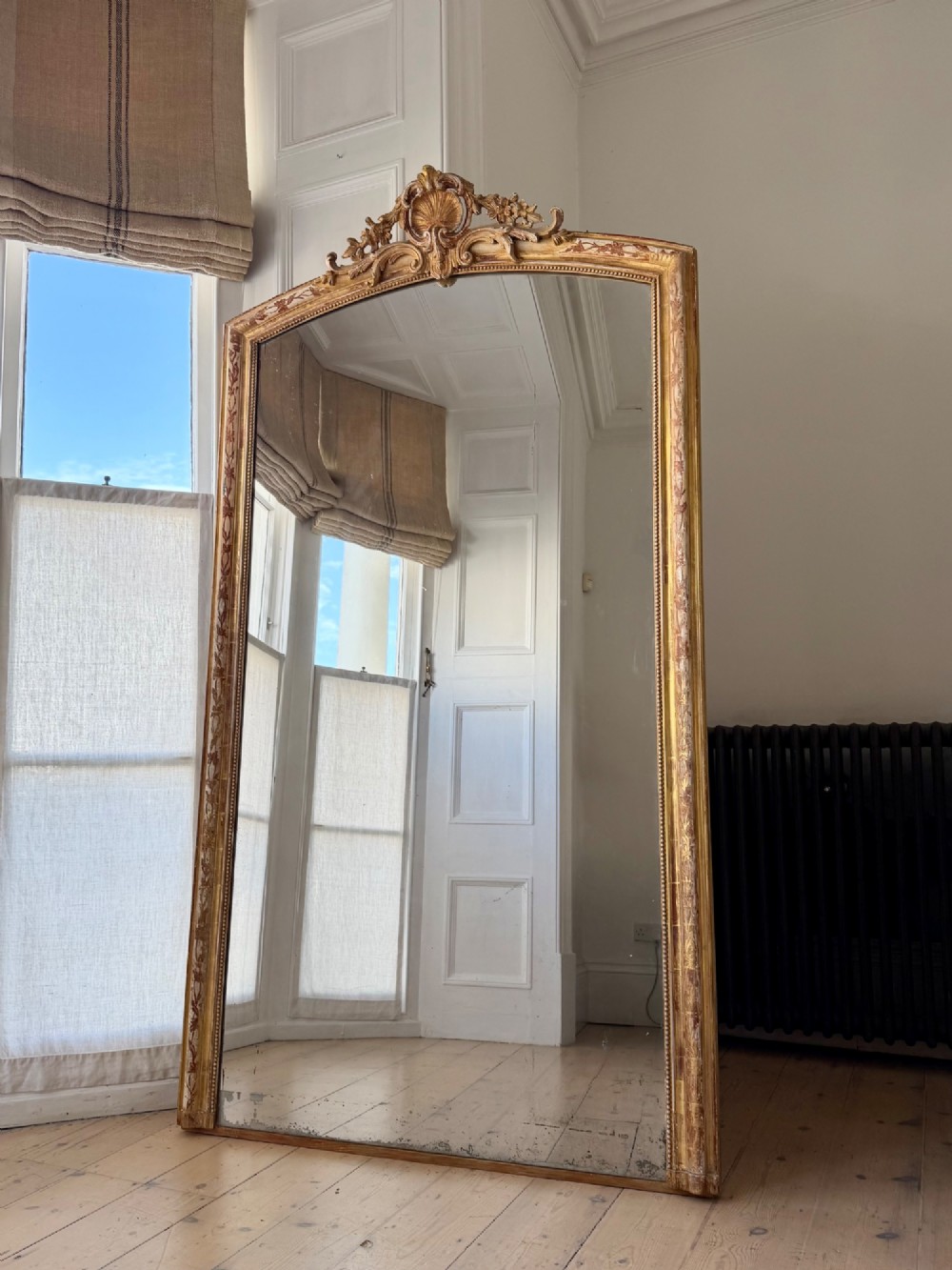 Large antique French gilt leaner mirror View II