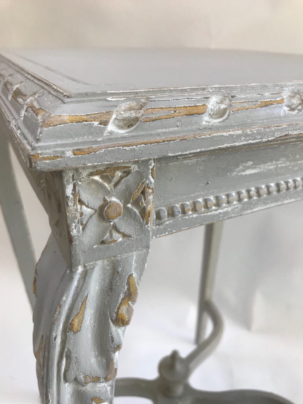 A light grey painted square side table featuring carved cabriole legs, a beaded apron, and an X-shaped stretcher with a central finial. View III