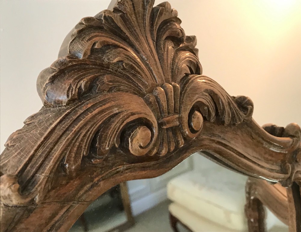 A three-panel French walnut dressing table mirror with carved acanthus leaf crest and cabriole feet. View III