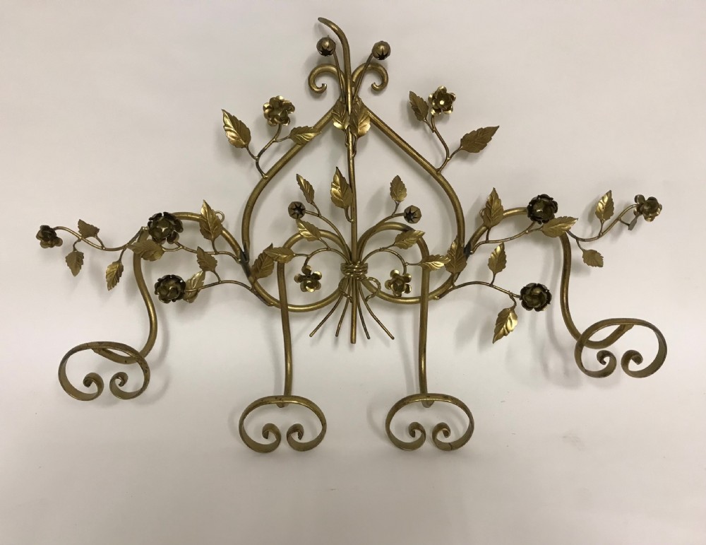 A decorative French gilded metal wall-mounted hook rack featuring elaborate scrollwork, sculpted metal leaves, and flower motifs with four bottom hooks. View III