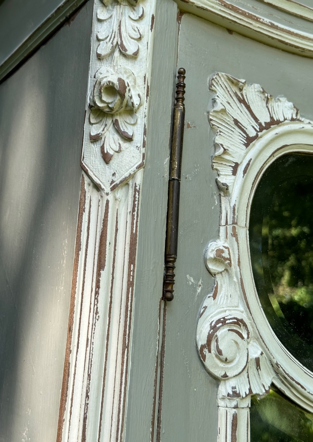 A tall grey and off-white painted French armoire featuring arched mirrored double doors, carved cresting at the top, and short cabriole legs. View VI