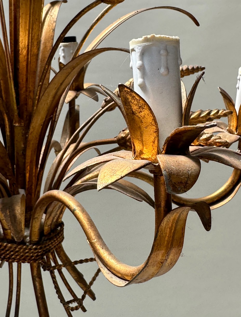 A French gilded metal chandelier crafted in the form of a tied sheaf of wheat with sculpted leaves and five candle bulb sleeves. View IV
