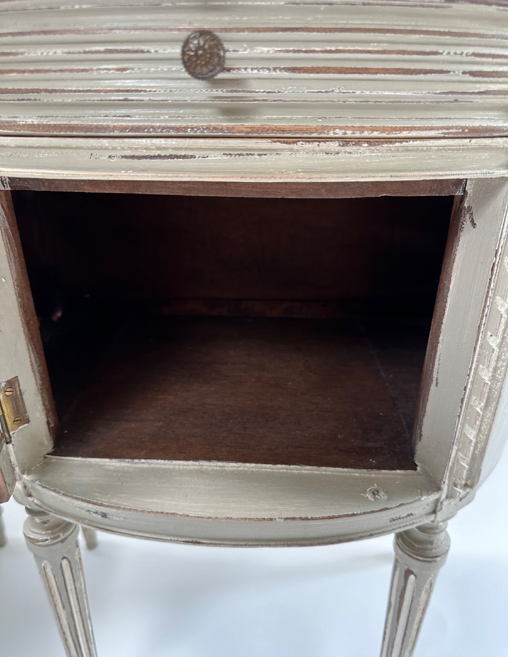 A pair of grey painted demi-lune bedside tables with variegated red marble tops and fluted tapering legs. View VIII