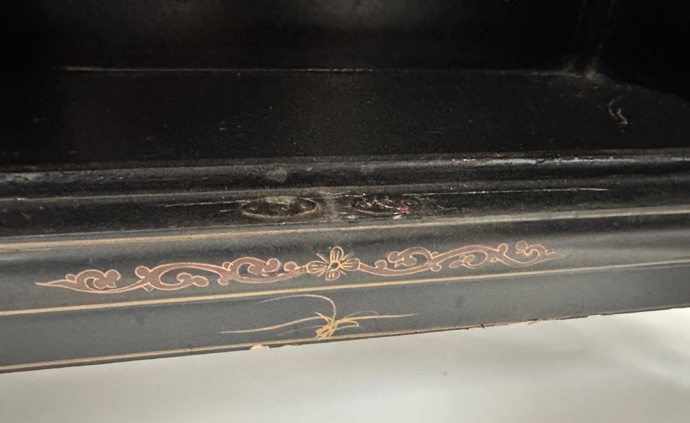A pair of black lacquered two-door Chinoiserie cabinets featuring carved hardstone inlays of horses, animals, and vessels, topped with gilt scrollwork motifs. View XVI