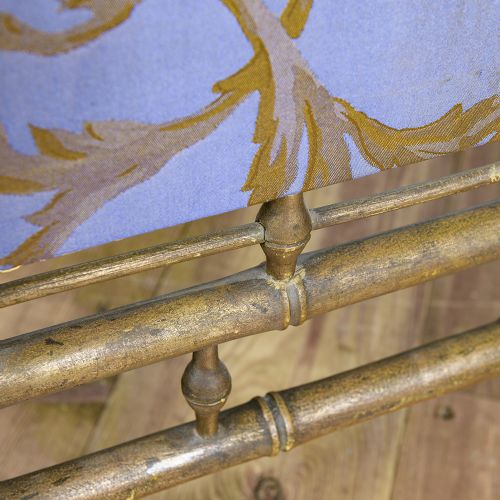 A Regency faux bamboo brass fire screen with an upholstered purple panel displaying gold acanthus leaf scrollwork. View VIII
