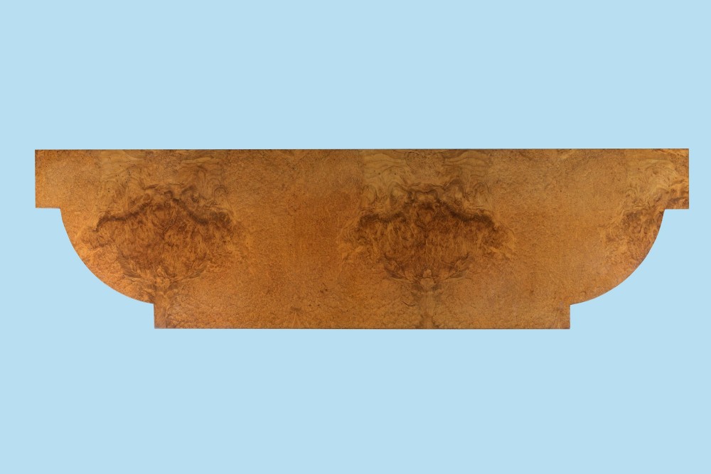A mid-19th-century burr walnut and amboyna side cabinet featuring open shelves, barley-twist column accents, and a curved breakfront silhouette. View IV