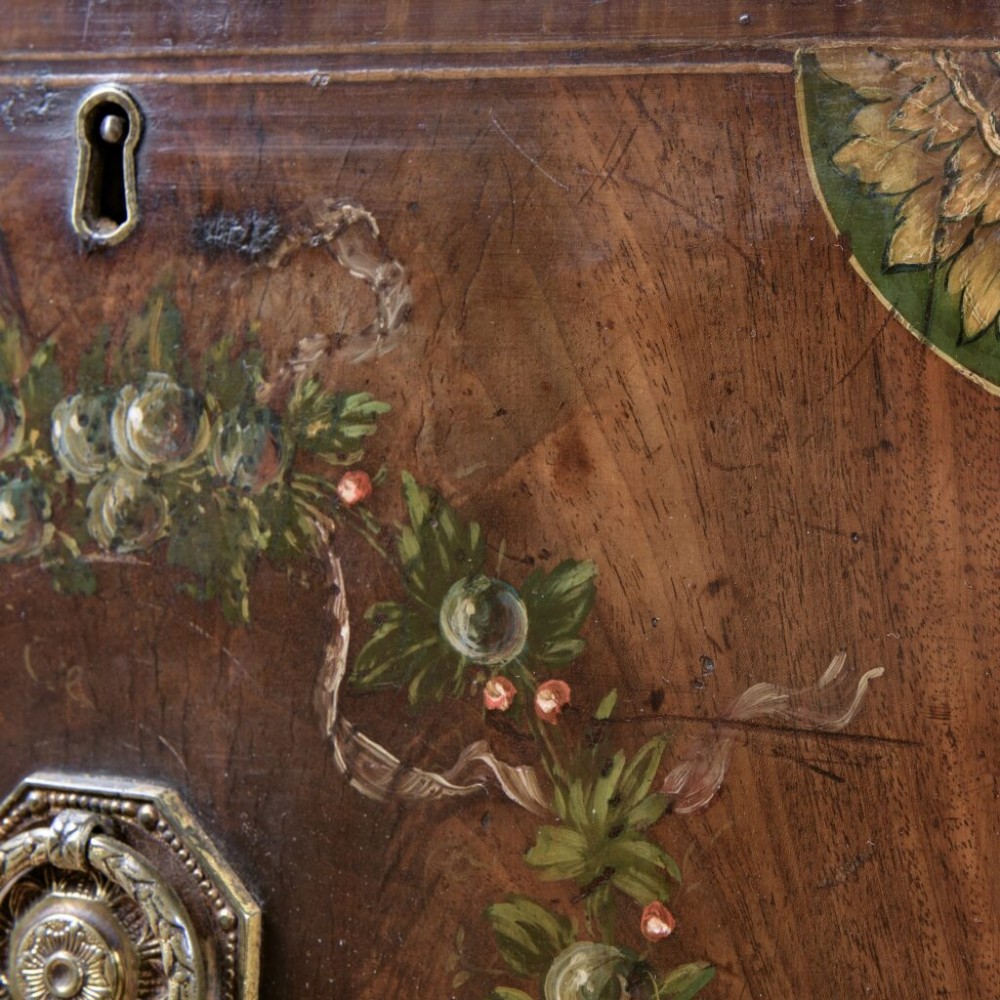 An 18th-century Georgian mahogany sideboard featuring hand-painted floral wreaths, fluted turned legs, and an elevated brass curtain rail. View III