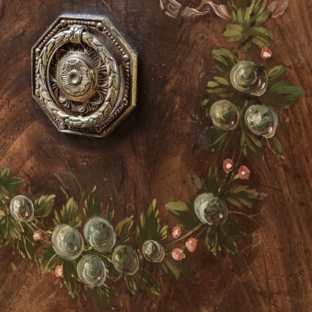 An 18th-century Georgian mahogany sideboard featuring hand-painted floral wreaths, fluted turned legs, and an elevated brass curtain rail. View IV