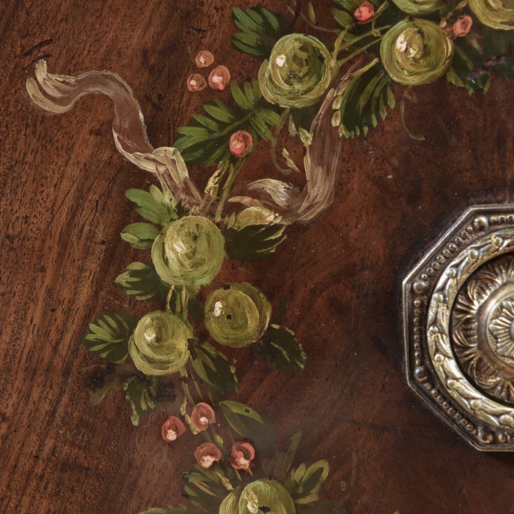 An 18th-century Georgian mahogany sideboard featuring hand-painted floral wreaths, fluted turned legs, and an elevated brass curtain rail. View VII
