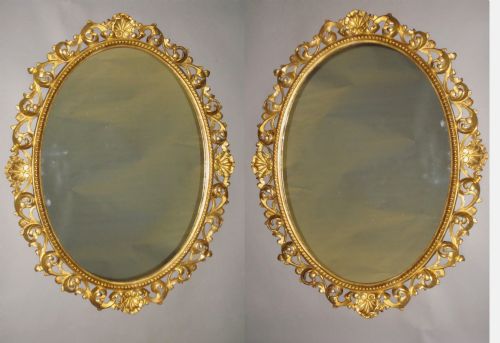 A Mid C19th Pair of Florentine Carved Giltwood Wall Mirrors
