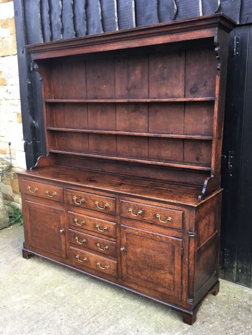 fig 1. Georgian oak dresser with cupboard base and original rack