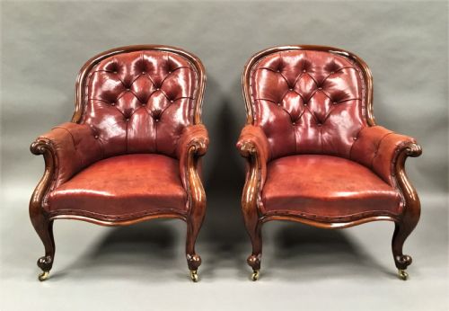 MID C19TH PAIR OF MAHOGANY AND LEATHER LIBRARY ARMCHAIRS - ADDITIONAL PHOTO 1