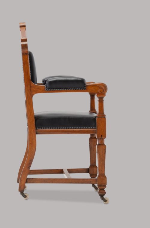 C19TH PAIR OF GOLDEN OAK AND LEATHER OPEN ARMCHAIRS IN THE GOTHIC MANNER - ADDITIONAL PHOTO 6