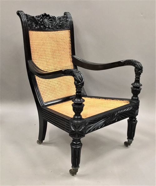 C19th Indian Carved Ebony Open Arm Library Chair; Finely Carved in Solid Ebony.  Galle District, Ceylon