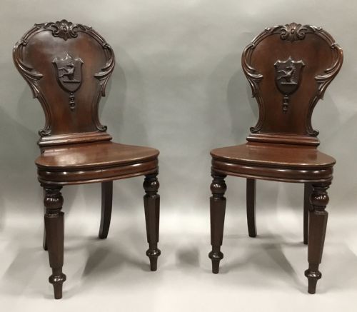 GEORGE IV SUBSTANTIAL PAIR OF MAHOGANY HALL CHAIRS WITH WELL CARVED HIPPOCAMPUS ARMORIALS - ADDITIONAL PHOTO 1