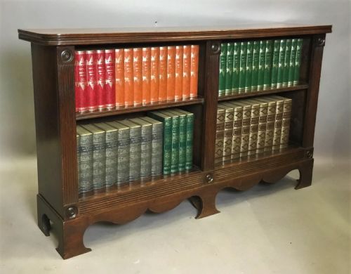 REGENCY 'COUNTRY HOUSE' MAHOGANY OPEN BOOKCASE OF AN UNUSUAL DESIGN