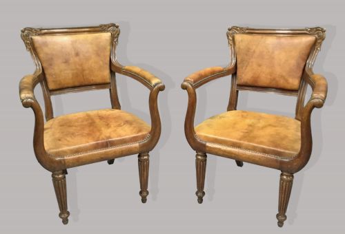 REGENCY PAIR OF OAK AND LEATHER LIBRARY CHAIRS