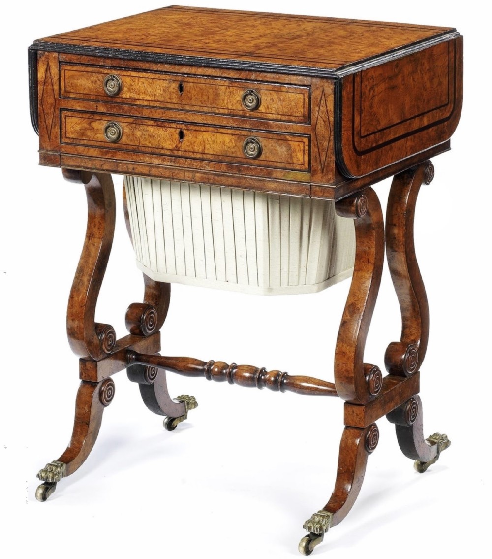 A good Regency burr elm and ebony inlaid work table