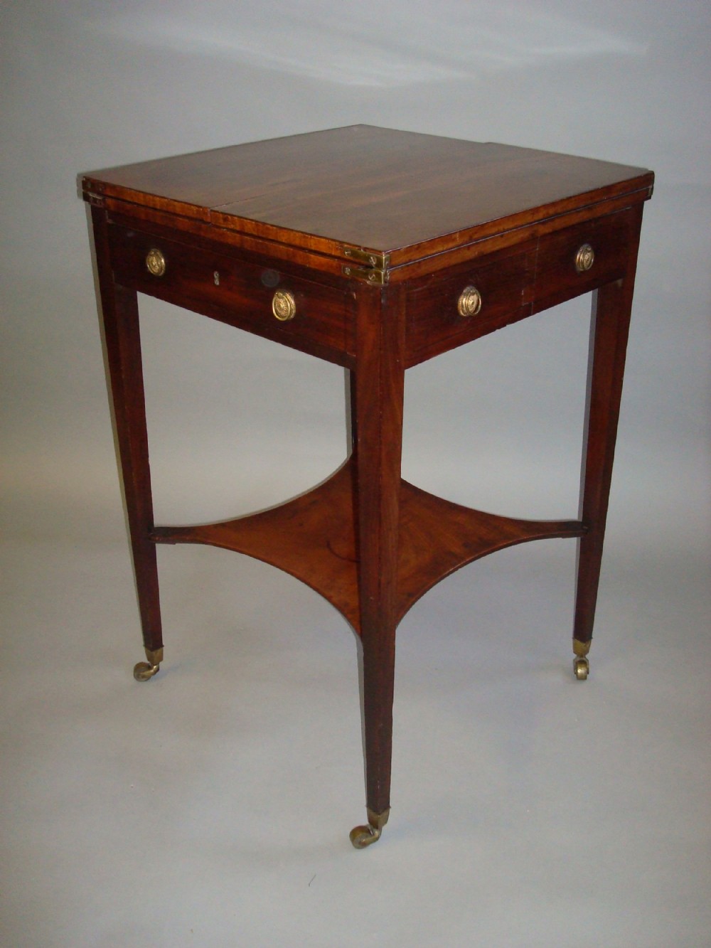 A good George III mahogany patience table