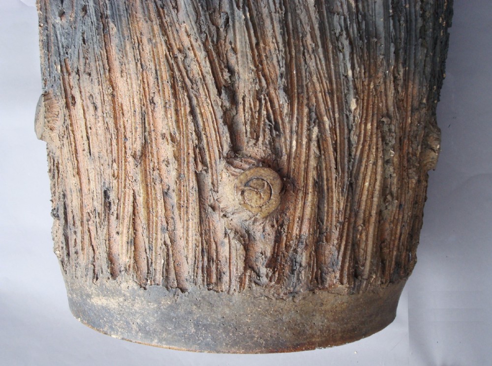 A nineteenth-century brown terracotta jardiniere textured to resemble bark with a scalloped upper rim. View VIII
