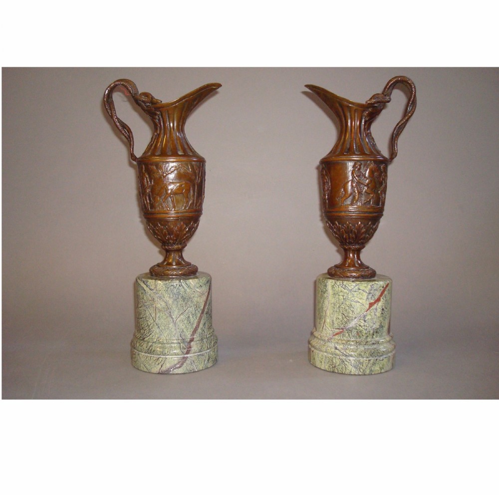 C19th Pair Bronze Ewers or Jugs on Marble plinth