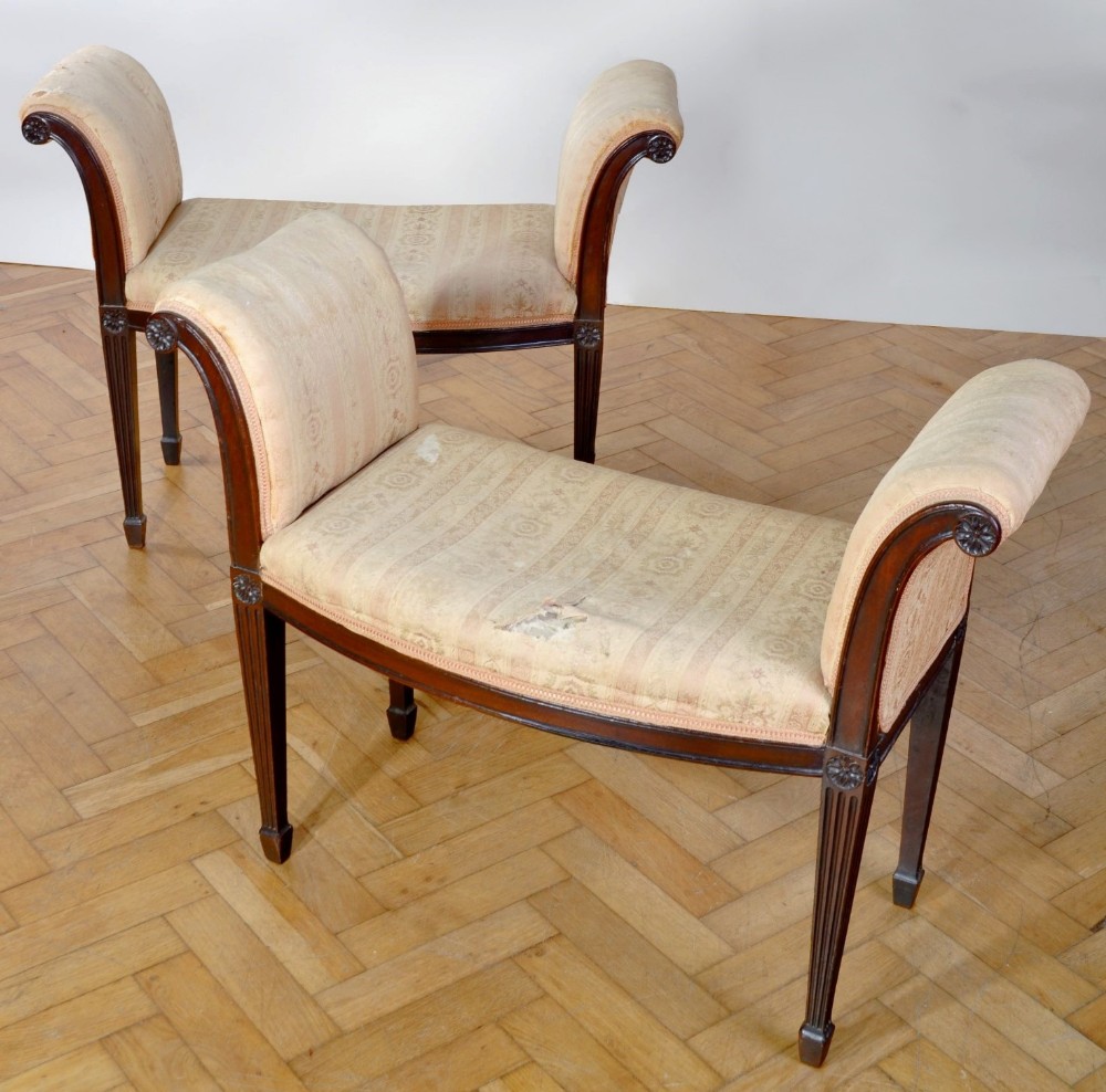 George III pair of mahogany window seats, in the manner of George Hepplewhite