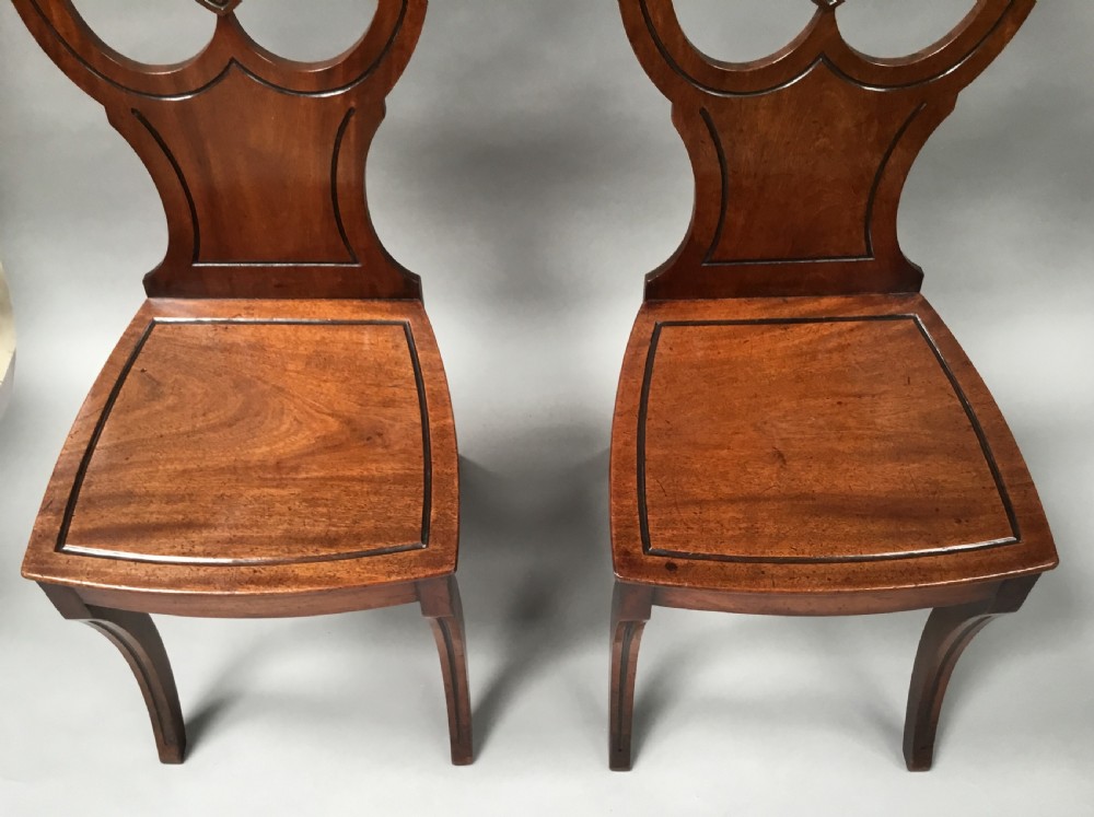 Regency pair of mahogany hall chairs View V