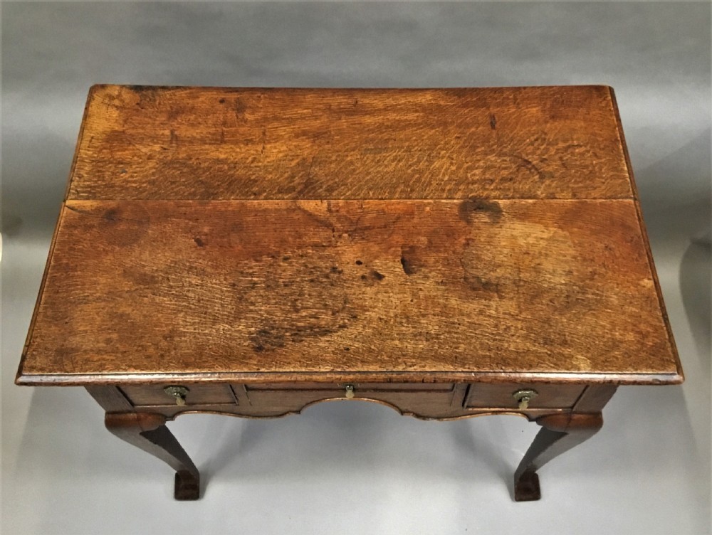 Georgian English oak lowboy View XI