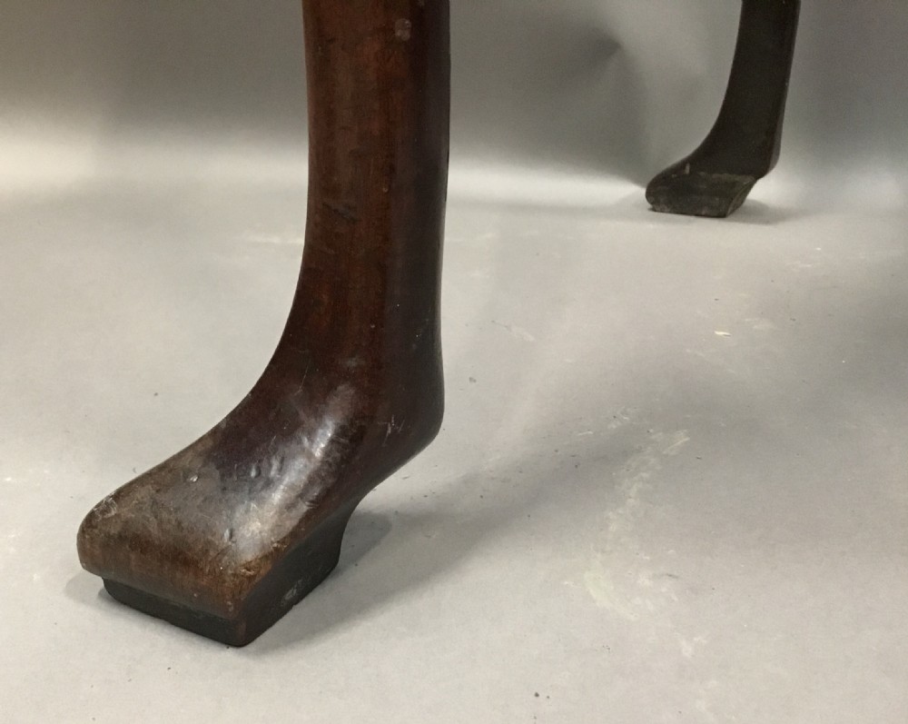 An 18th-century George II mahogany lowboy table featuring three drawers with brass drop handles, a shaped apron, and four cabriole legs with pad feet. View XVII