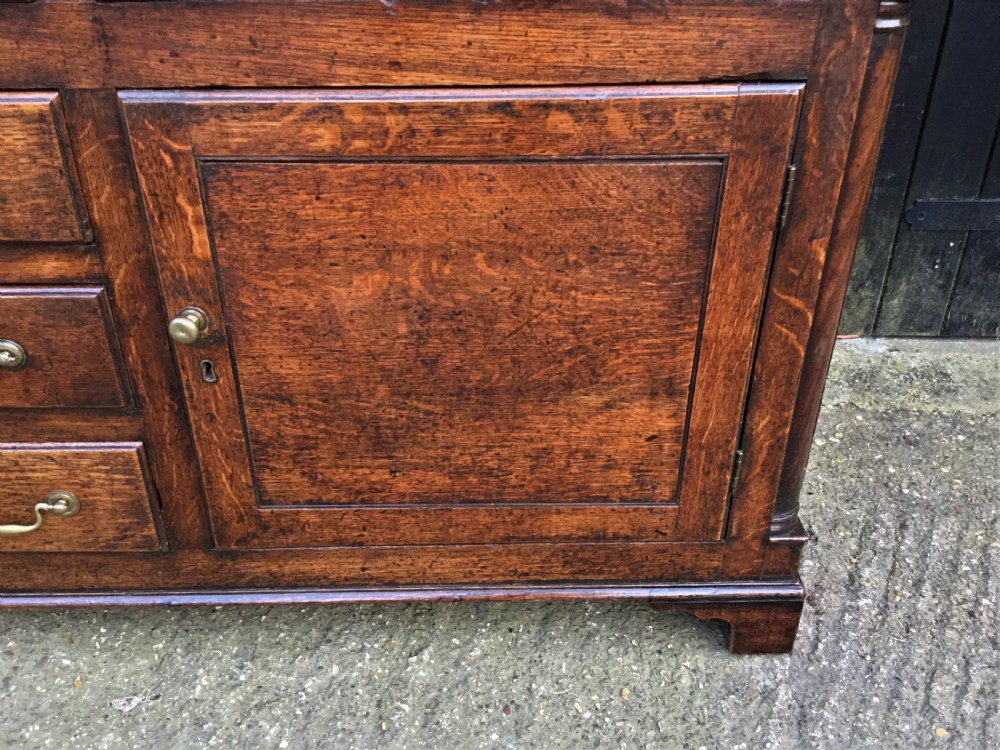 Georgian oak dresser with cupboard base and original rack View VII
