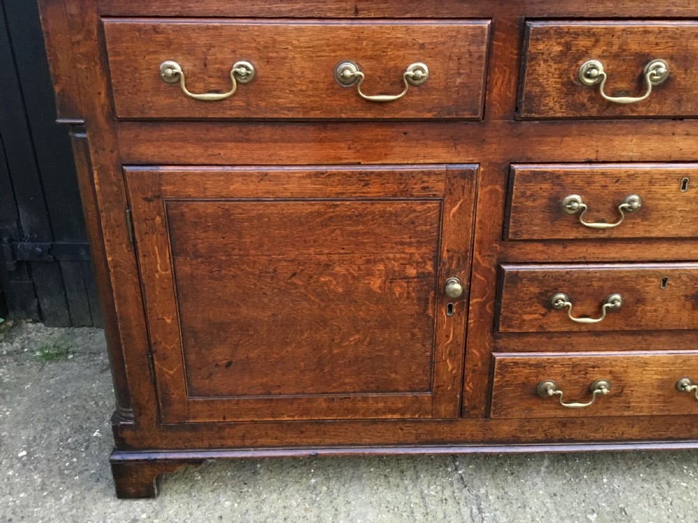 Georgian oak dresser with cupboard base and original rack View VIII