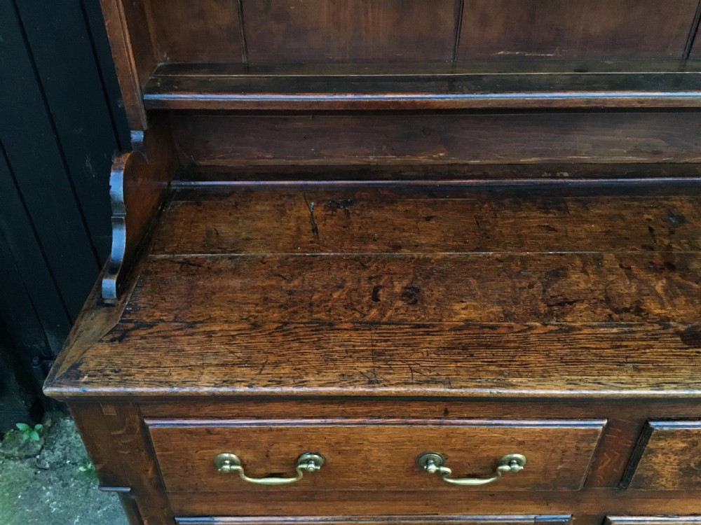 Georgian oak dresser with cupboard base and original rack View XII