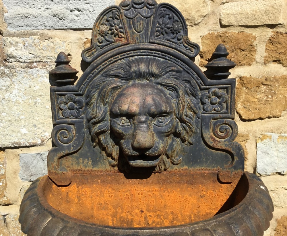 Early C20th cast iron lion mask wall fountain View VII