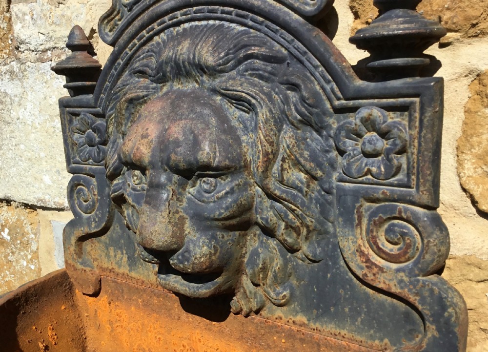 Early C20th cast iron lion mask wall fountain View XI