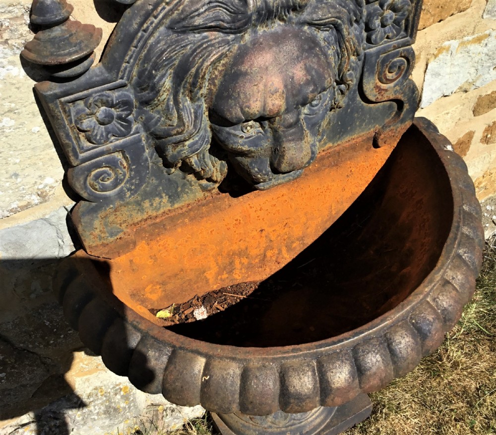 Early C20th cast iron lion mask wall fountain View XIII