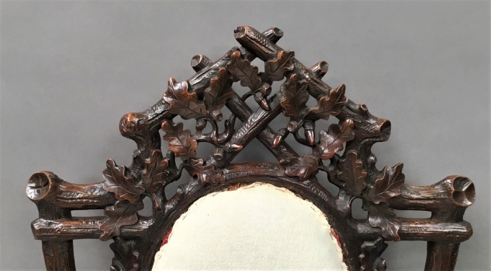 C19th pair of Black Forest open armchairs View V